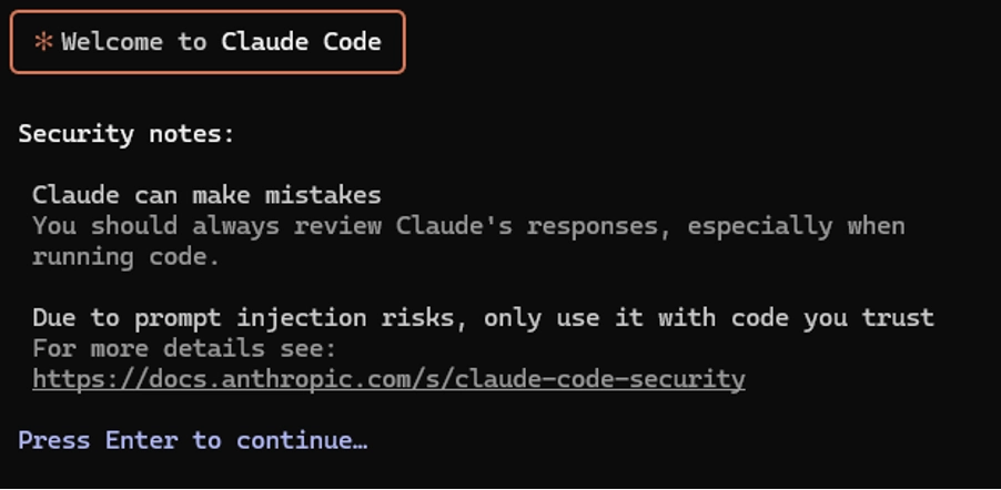 Terminal screen showing Claude Code’s startup warning message about potential mistakes and prompt injection risks, with a link to security documentation.